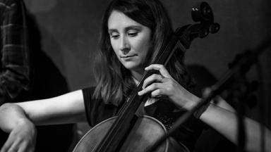 woman playing an instrument